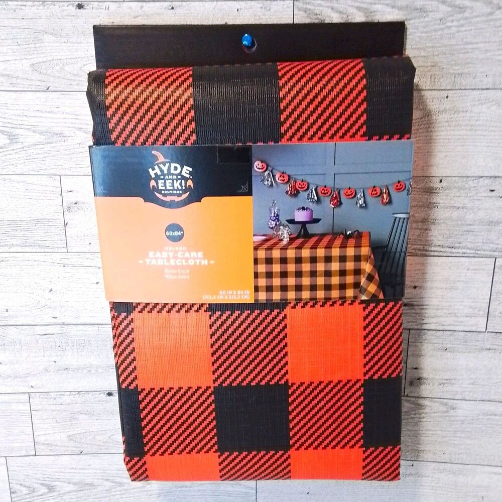 Hyde & EEK! Boutique 60x84 Oblong Tablecloth Vinyl Blend Orange/Black Plaid